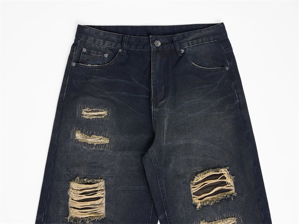 Jean streetwear pour homme avec patchs usés, coupe ample droite délavée style grunge 13