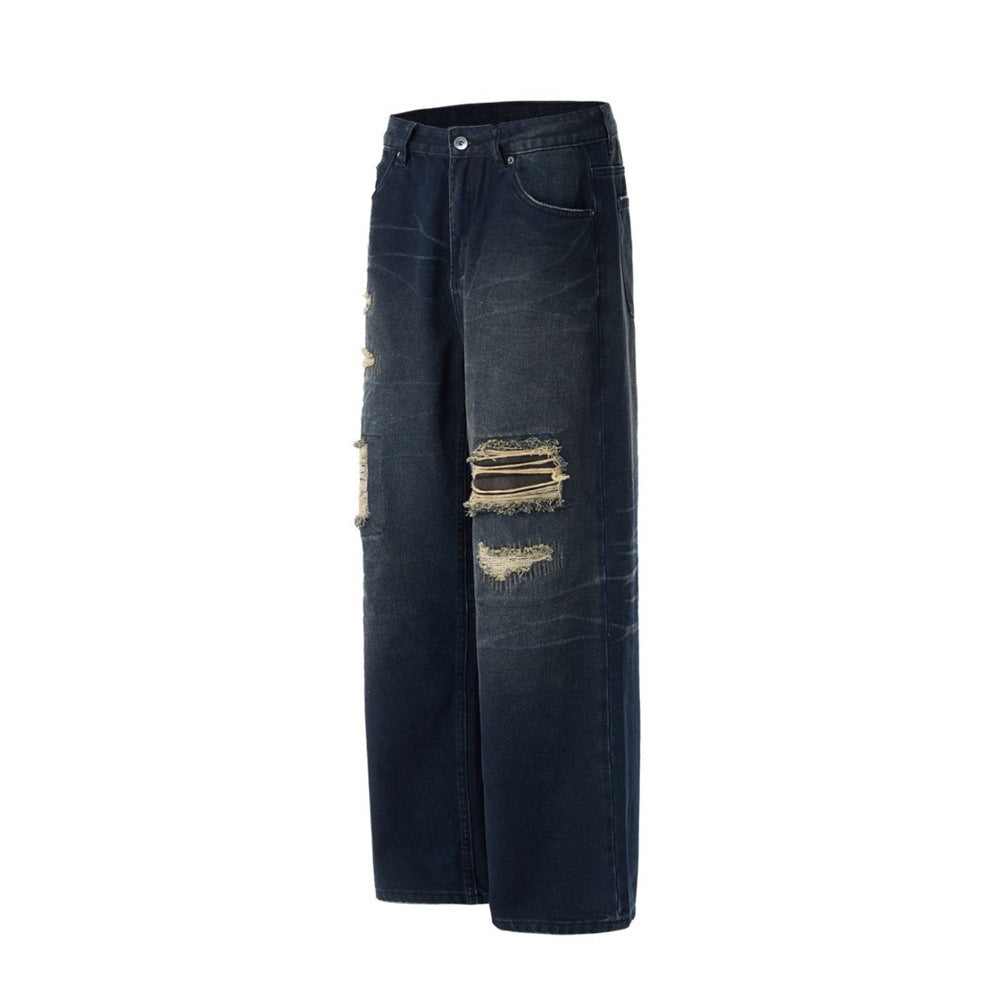 Jean streetwear pour homme avec patchs usés, coupe ample droite délavée style grunge 11