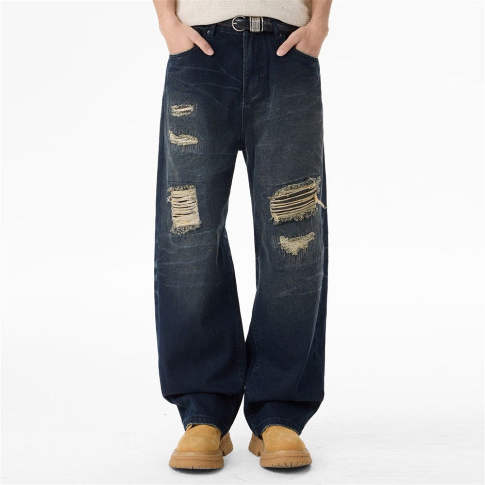 Jean streetwear pour homme avec patchs usés, coupe ample droite délavée style grunge 7