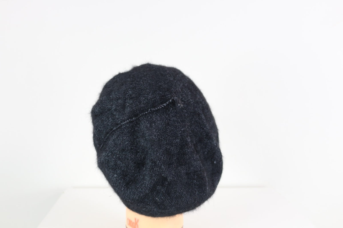 Béret Bella Julietta noir chiné vu de dessus avec couture visible – Frippin'Dealz