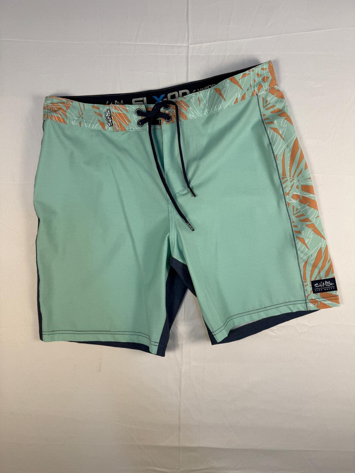 Boardshort Salt Life vert menthe posé à plat avec lacet bleu marine – Frippin'Dealz