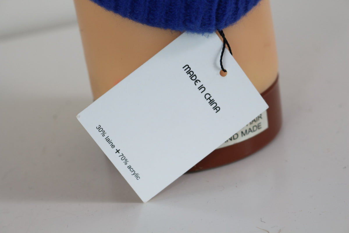 Étiquette de composition du bonnet bleu : 30 % laine, 70 % acrylique – Frippin'Dealz