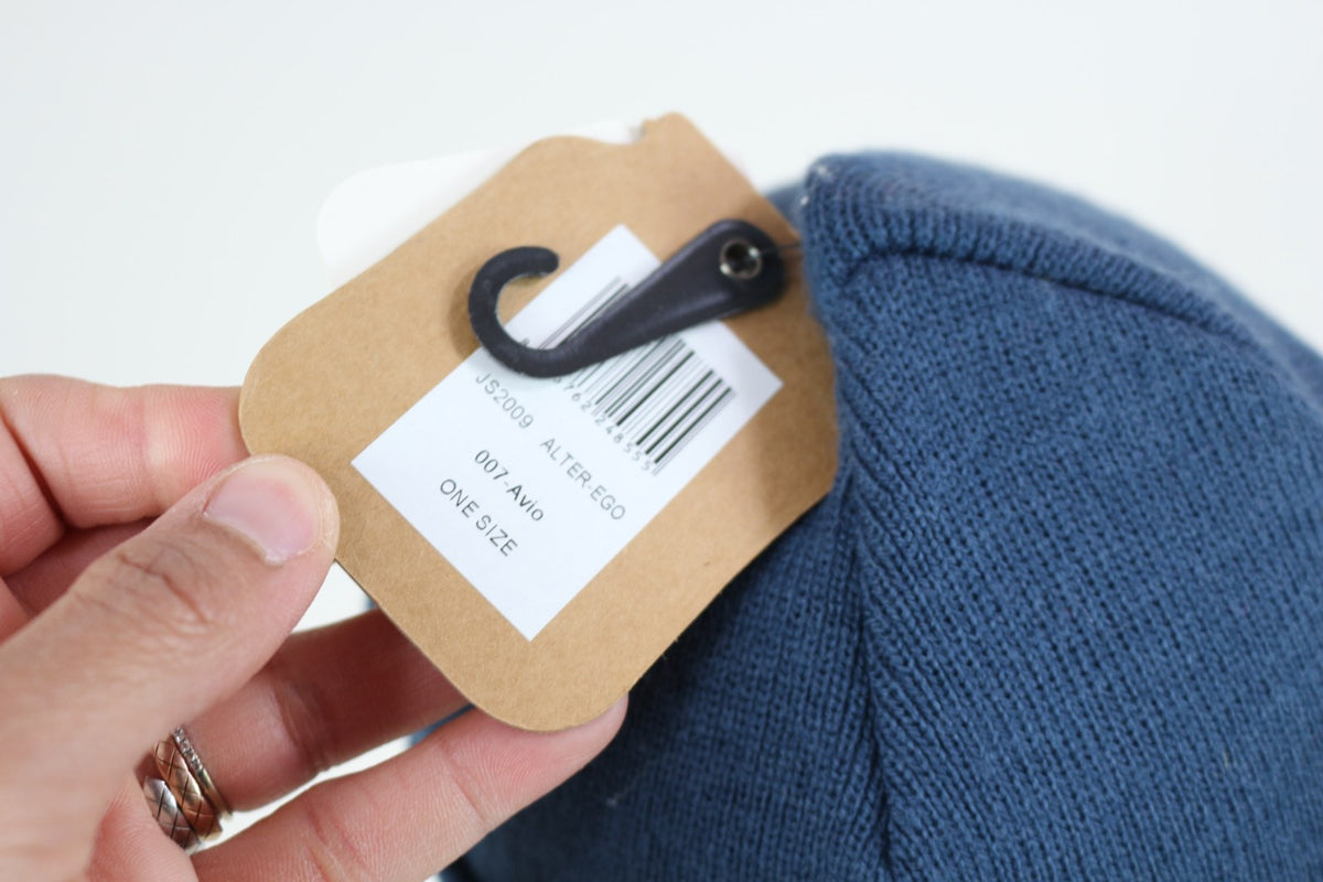 Étiquette cartonnée du bonnet Jail Jam avec référence et taille One Size – Frippin'Dealz