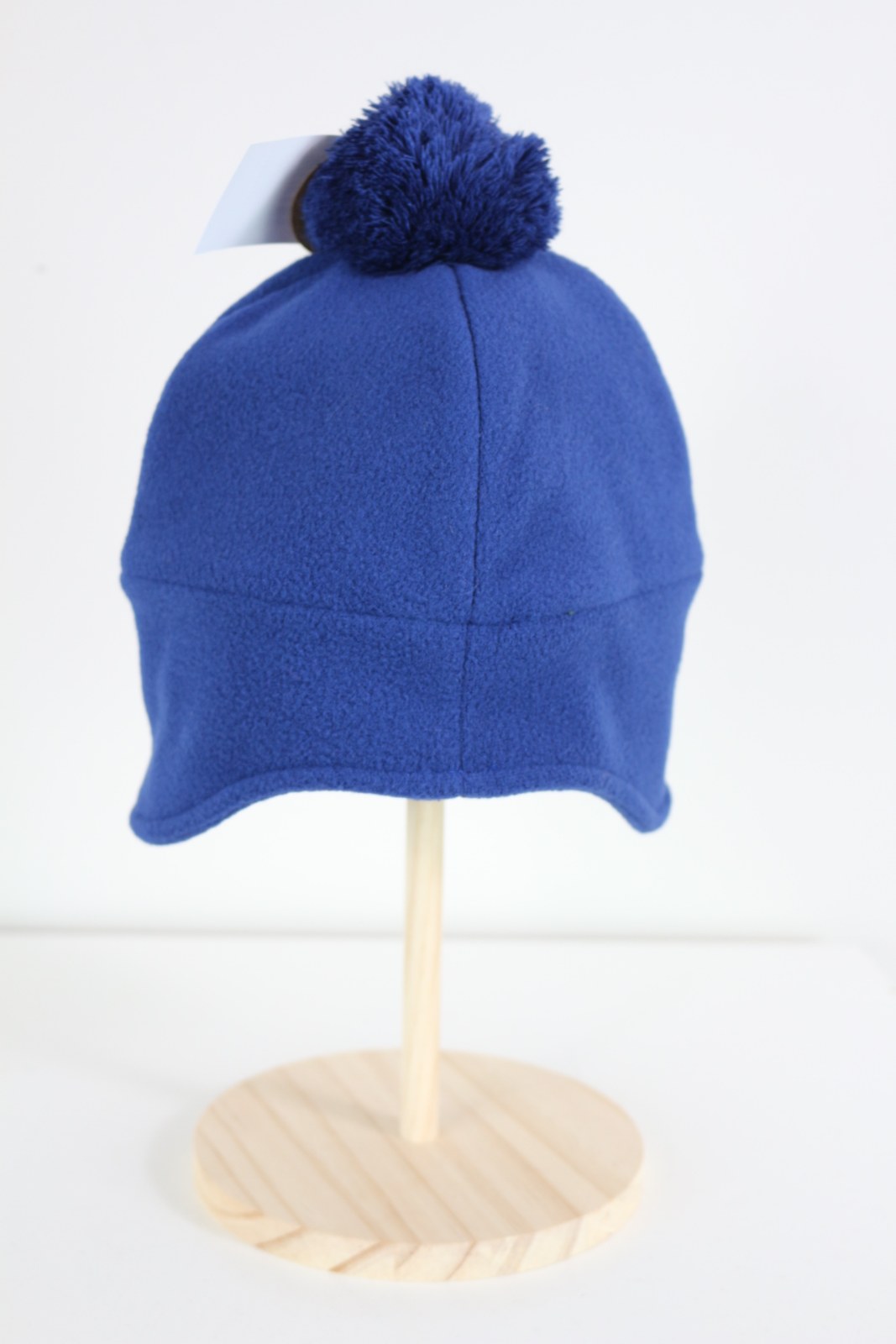Bonnet Vans bleu roi vu de dos avec pompon et oreillettes en polaire – Frippin'Dealz