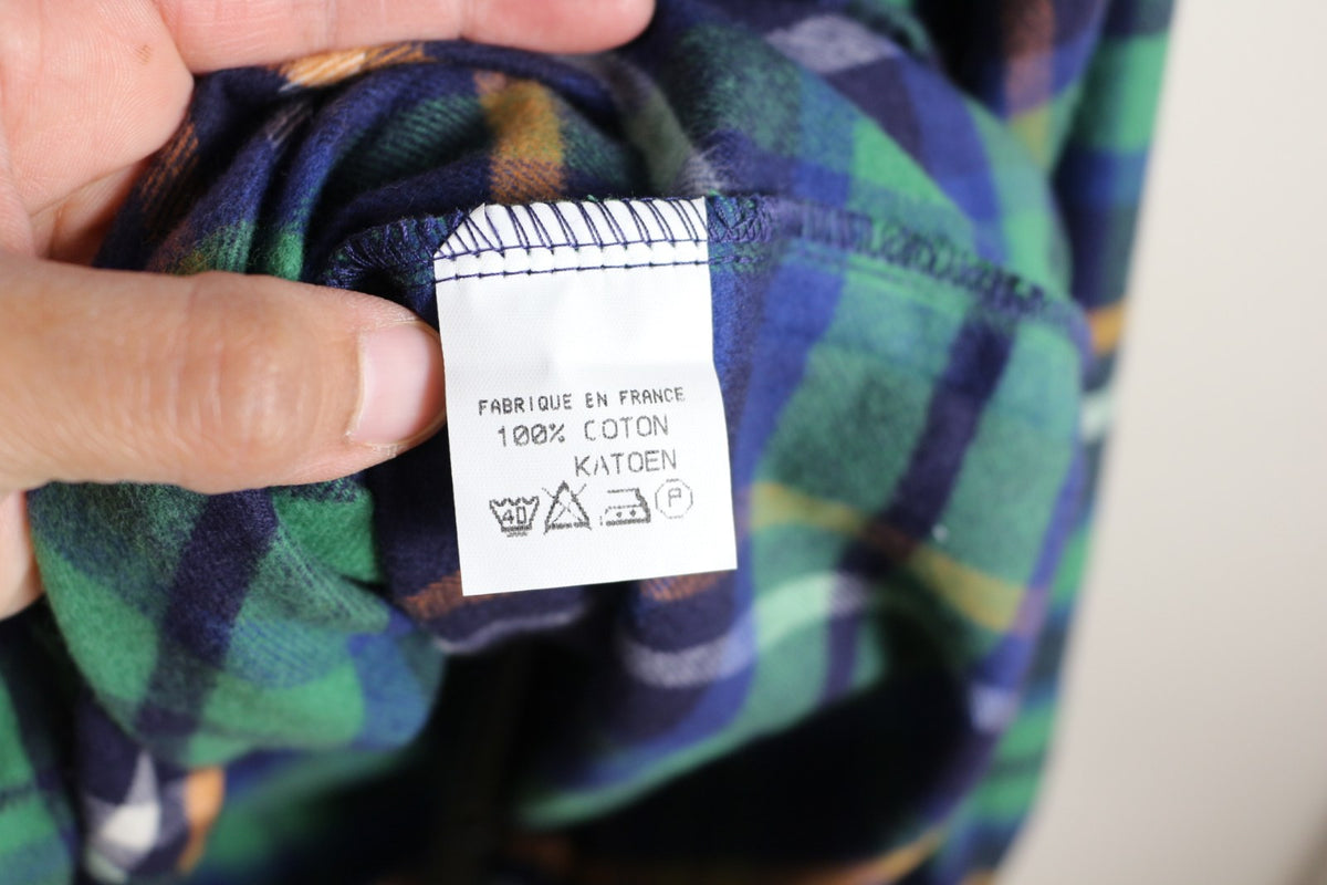 Étiquette d'entretien et de composition de la chemise Falino à carreaux – Frippin'Dealz