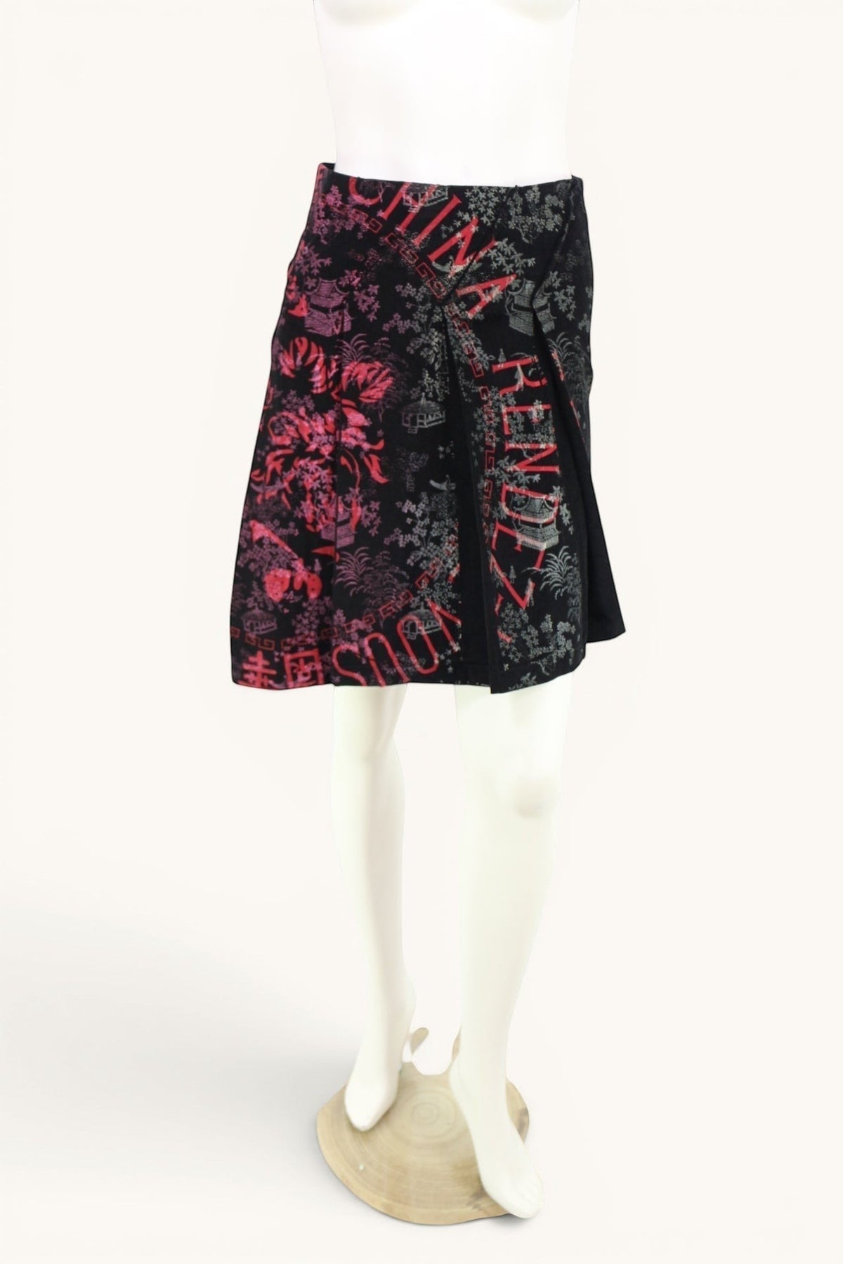 Jupe portefeuille Custo Barcelona en velours côtelé noir avec imprimé japonisant rose et gris. Taille 34.