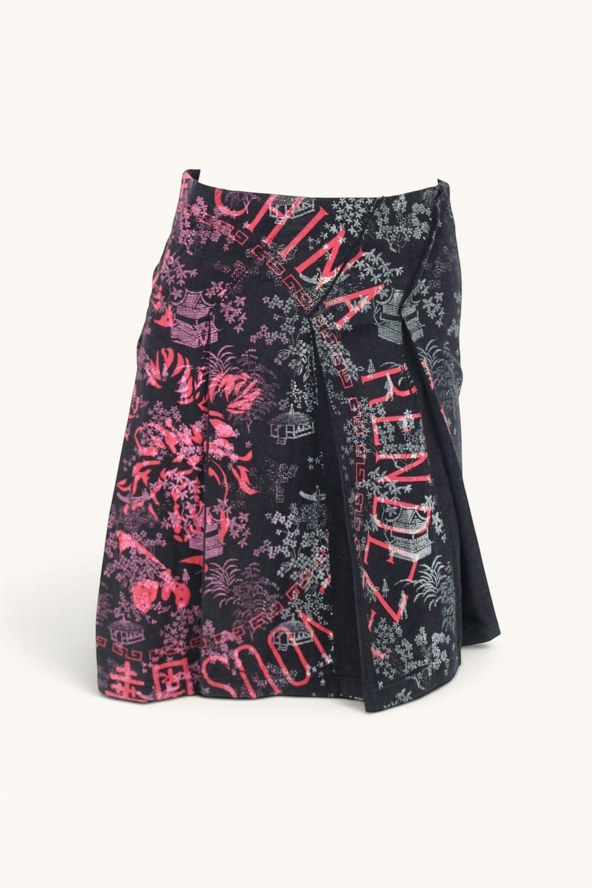 Jupe portefeuille Custo Barcelona en velours côtelé noir avec imprimé japonisant rose et gris. Taille 34.
