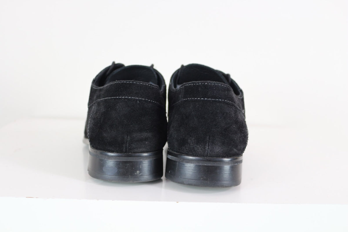Talons des derbies Lloyd noires en daim vus de dos – Frippin'Dealz