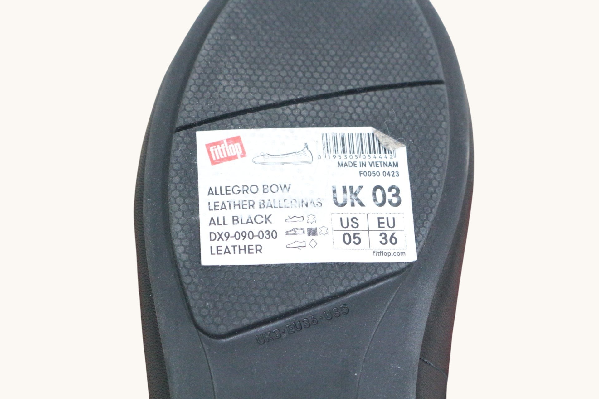 Semelle noire de ballerine Frippindealz FitFlop avec étiquette descriptive indiquant la taille et le cuir