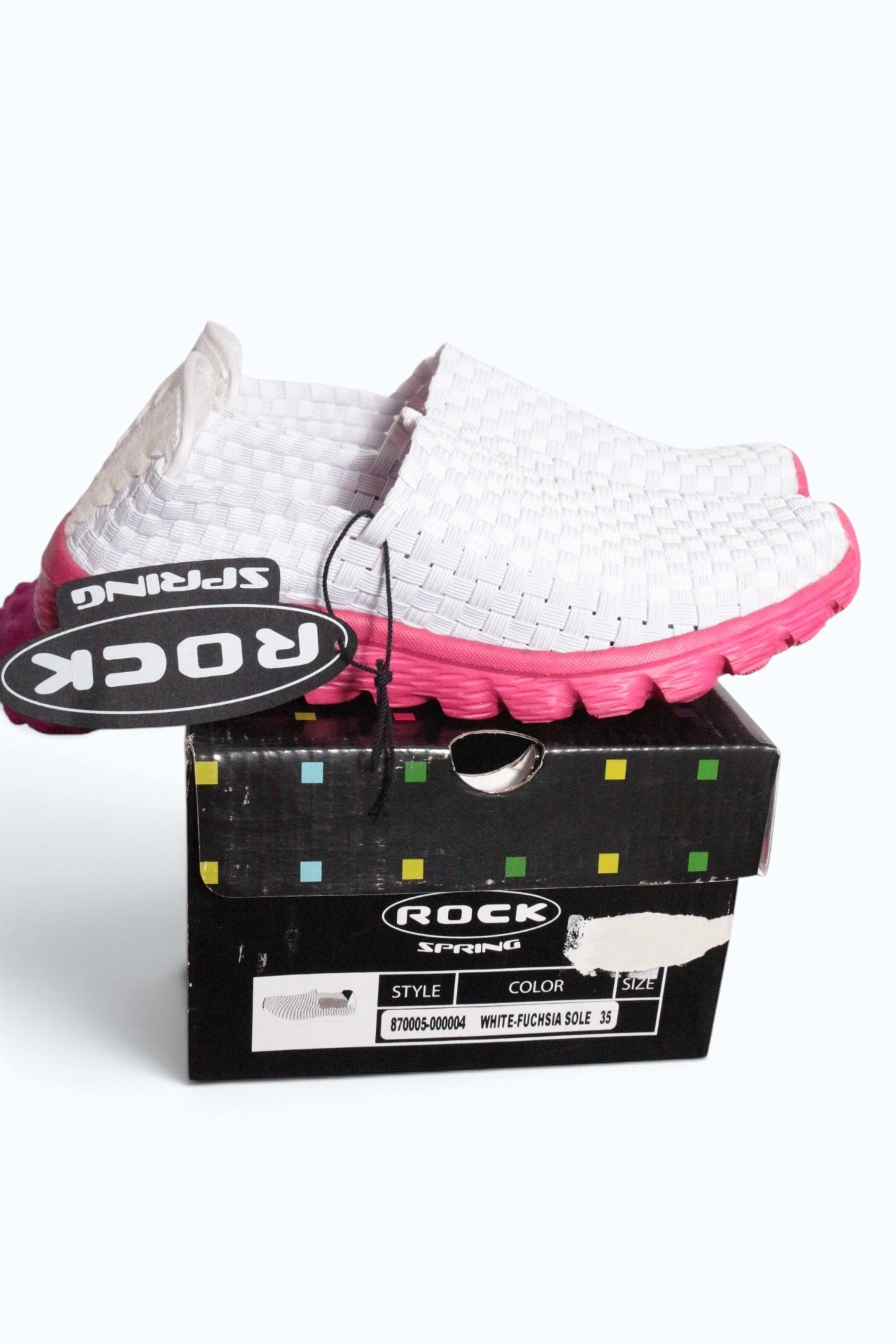 Baskets Frippindealz Rock Spring pour femme en textile tressé blanc avec semelle fuchsia sur leur boîte d'origine