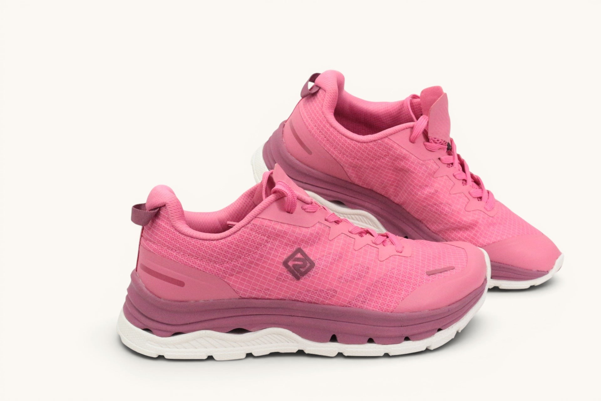 Baskets de running Frippindealz roses en cuir synthétique avec semelle blanche adhérente pour femme