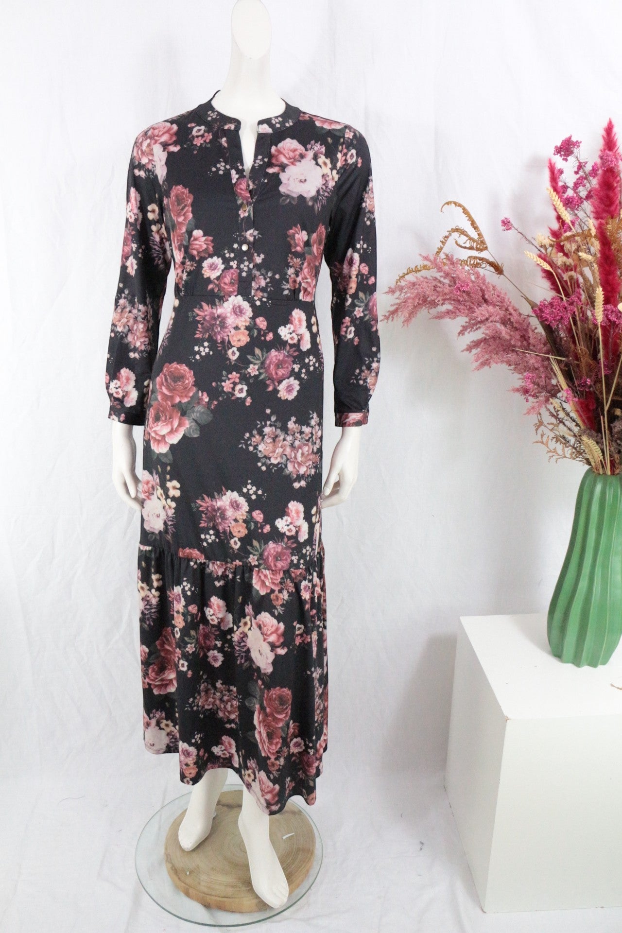 Frippindealz K design black polyester maxi dress with long sleeves and a tiered floral print skirt.