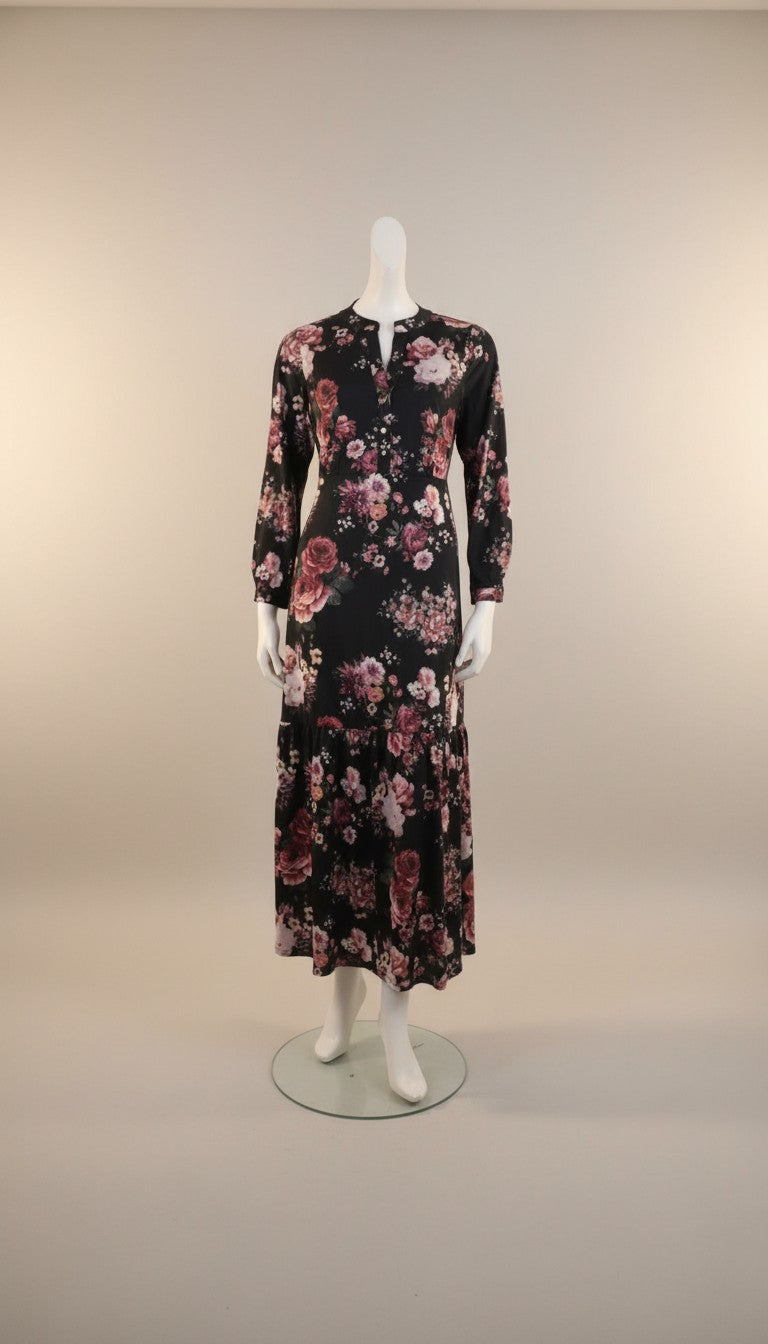 Frippindealz black polyester maxi dress with long sleeves and a floral print. Features a tiered hem and a button-up neckline.