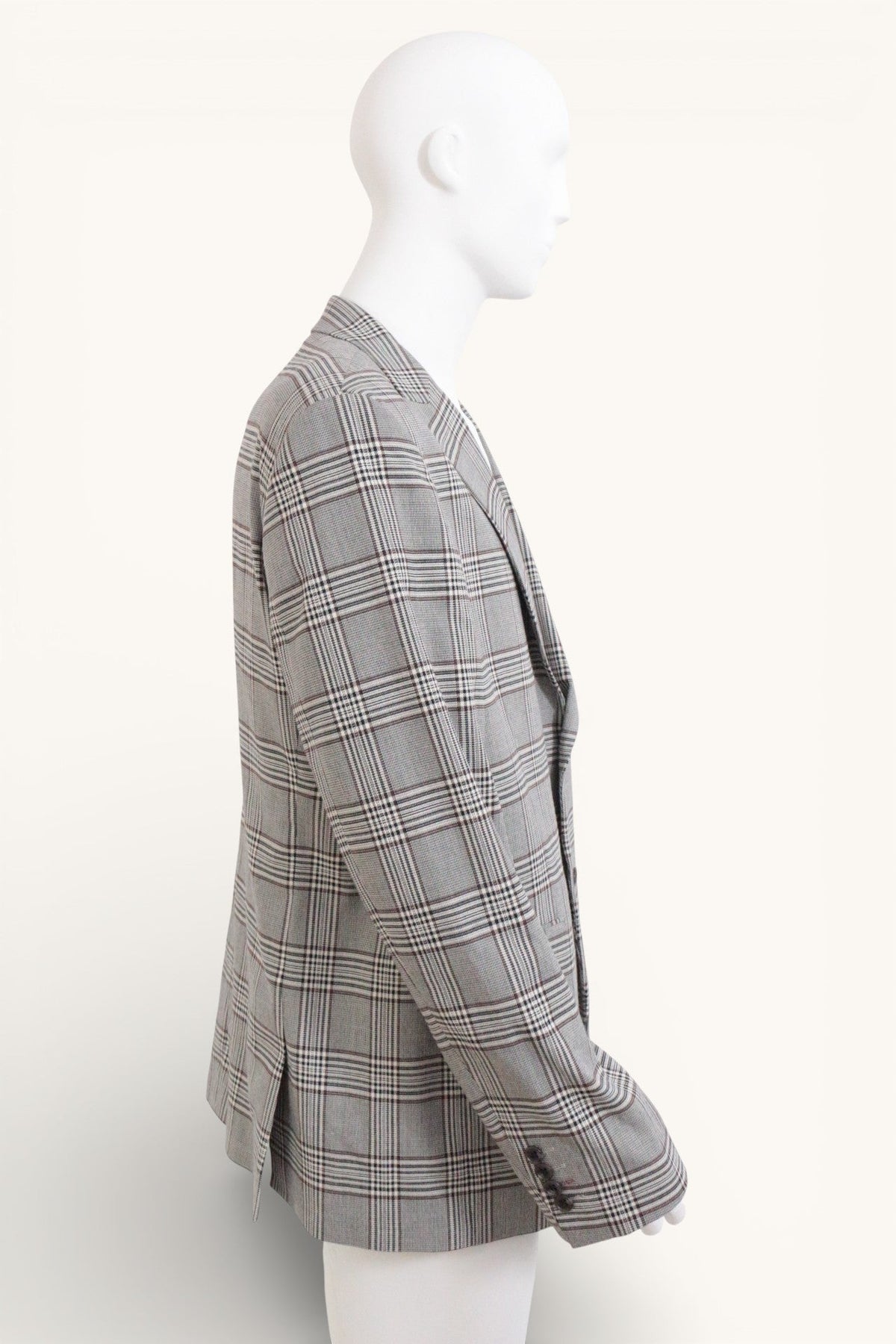 Blazer Frippindealz Ziltt à carreaux noir et blanc en mélange de polyester et viscose, vue de profil sur mannequin