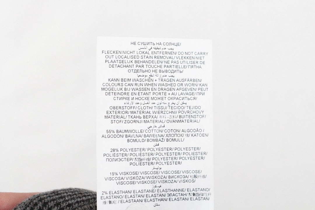 Étiquette de composition textile du pantalon Frippindealz BRAX en coton, polyester, viscose et élasthanne