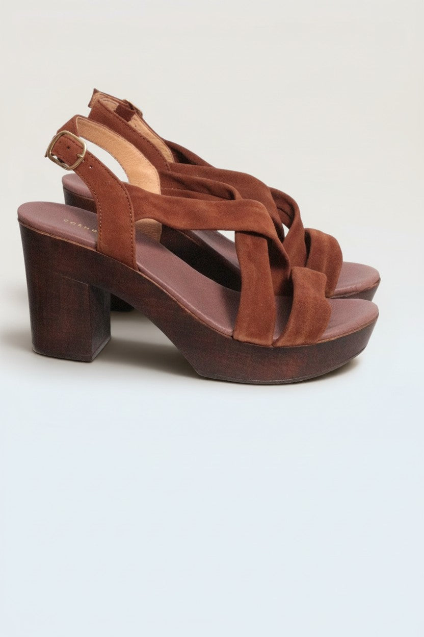 Frippindealz brown suede platform sandals with criss-cross straps and a 10cm wooden block heel. Adjustable ankle strap.