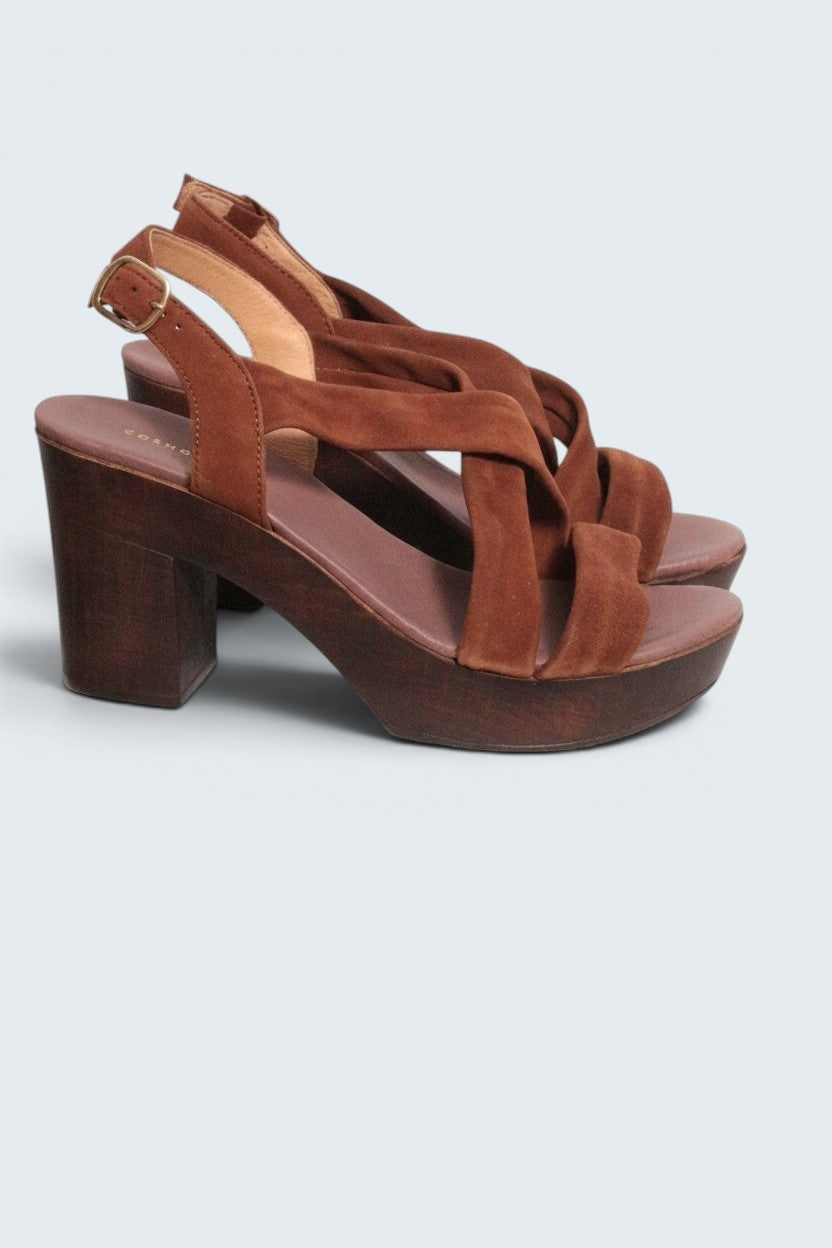 Frippindealz brown suede platform sandals with criss-cross straps and a 10cm wooden block heel. Adjustable ankle strap.
