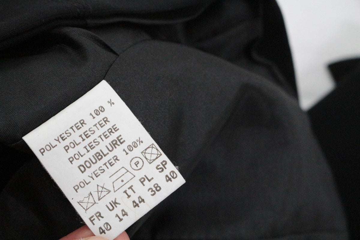 Étiquette de composition en polyester 100% de la veste noire Frippindealz Camaïeu