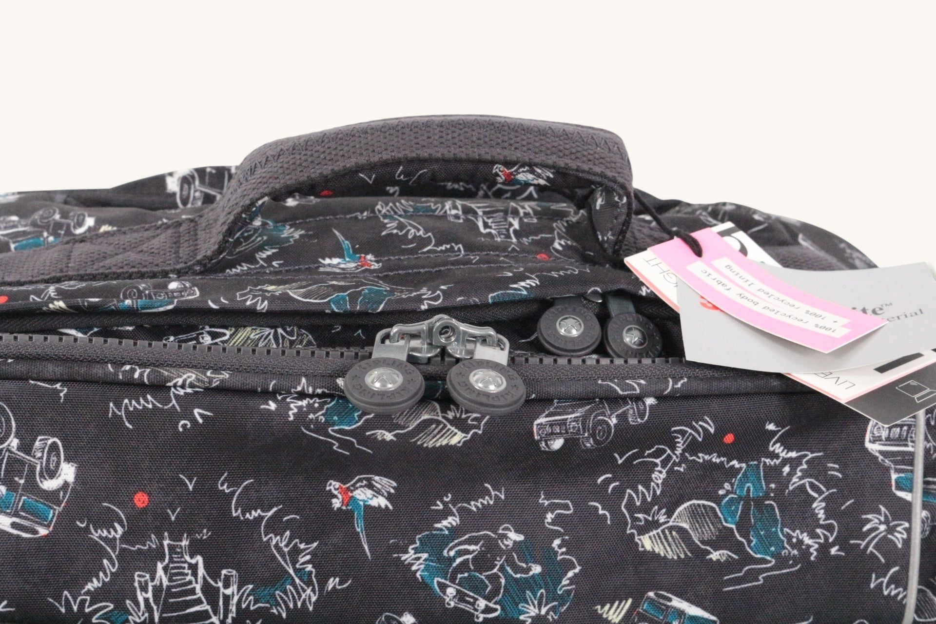 Cartable à roulettes Frippindealz Kipling New Storia noir avec motifs jungle, neuf avec étiquette et poignée robuste.