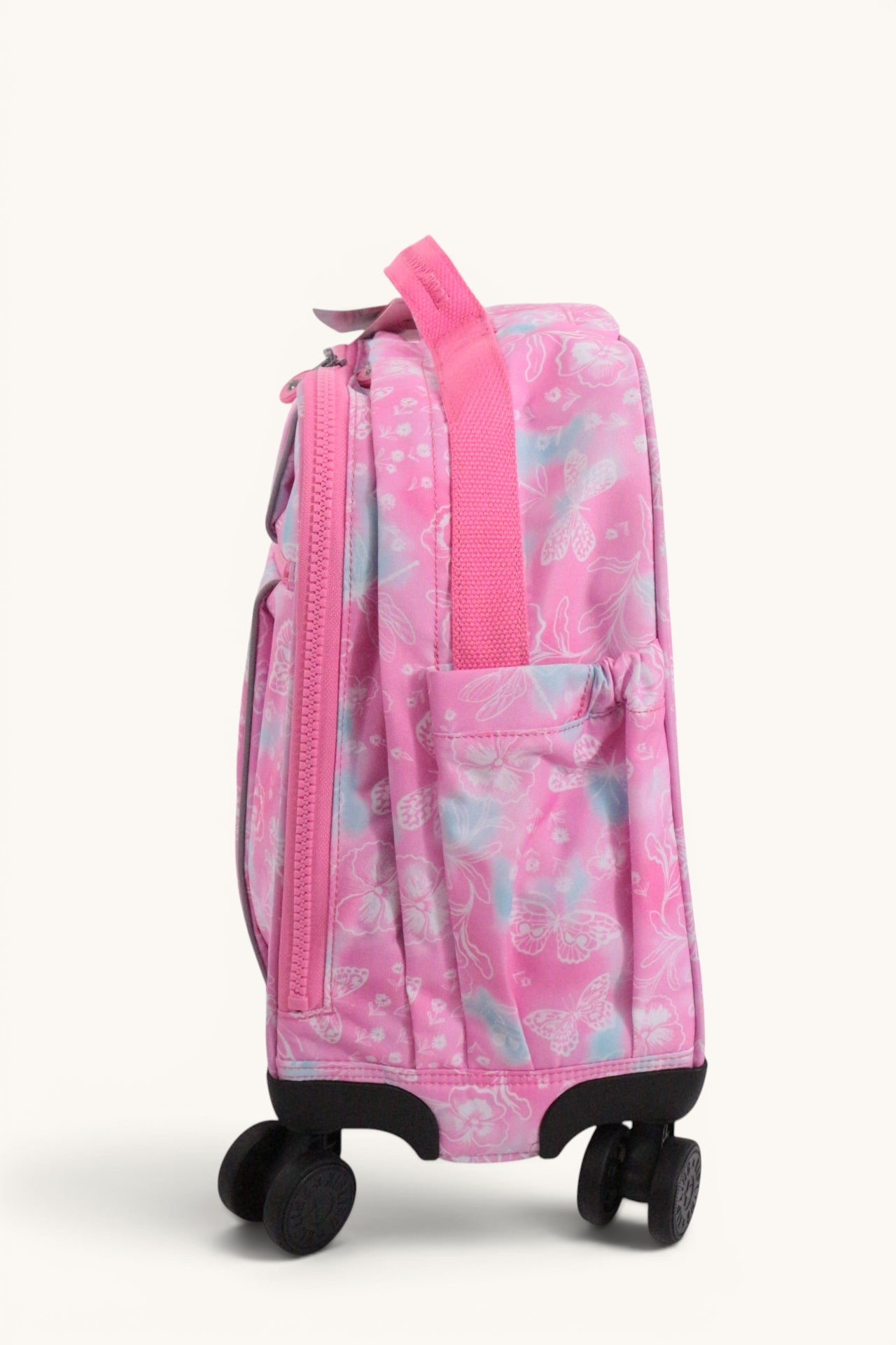 Cartable à roulettes Frippindealz Kipling New Storia rose à motifs fleurs et papillons avec 4 roues pivotantes.