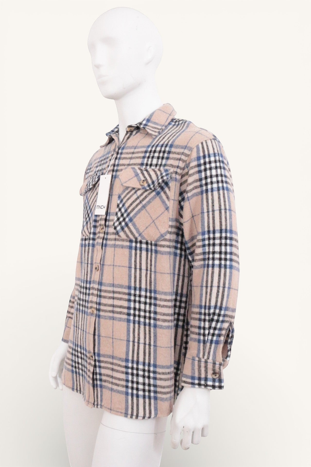Chemise à carreaux beige, noire et bleue de Frippindealz, en acrylique, coton et polyester. Manches longues, poches poitrine.