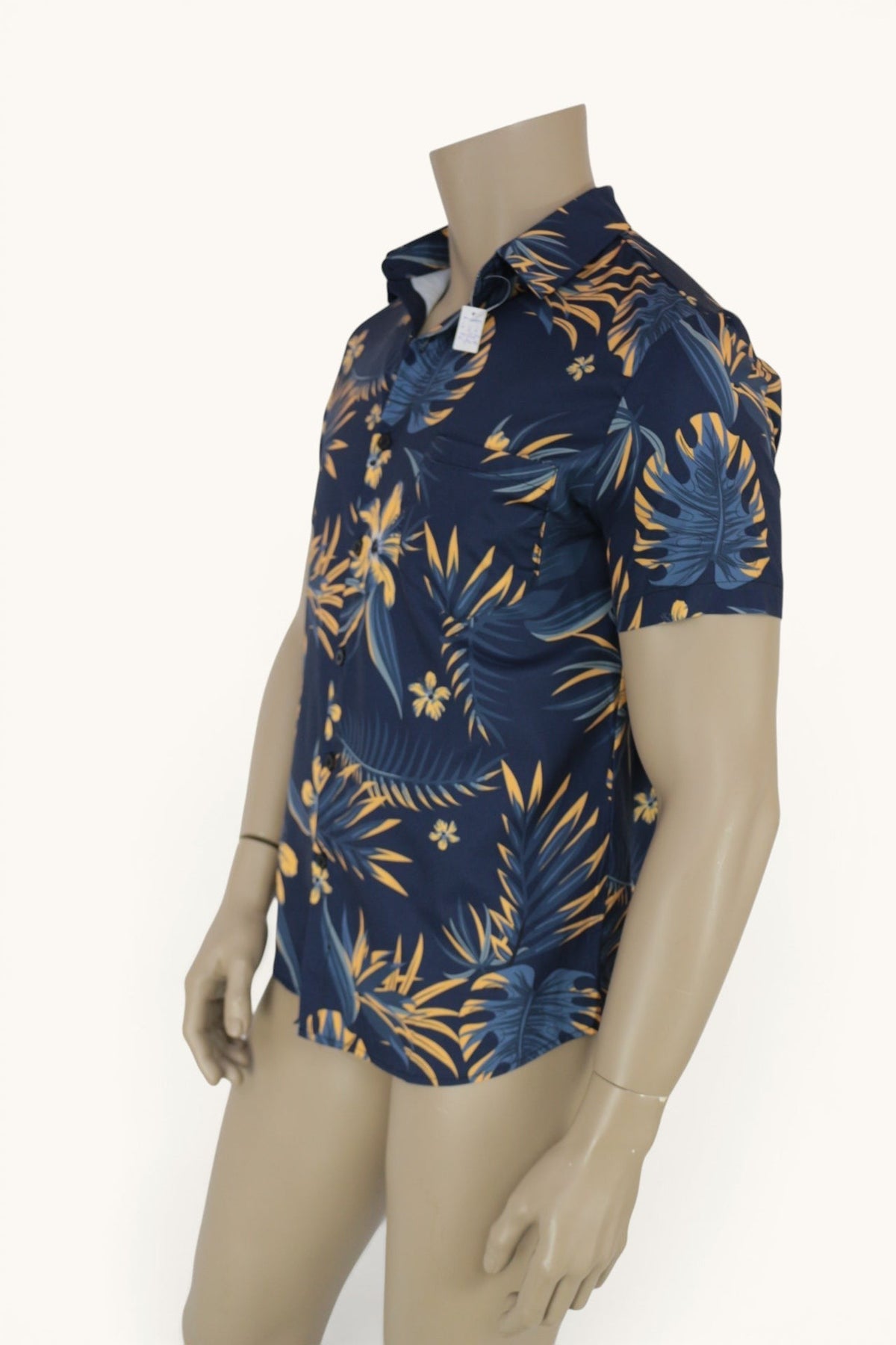 Chemise homme Frippindealz bleu marine à manches courtes avec imprimé tropical jaune et bleu, col classique et poche