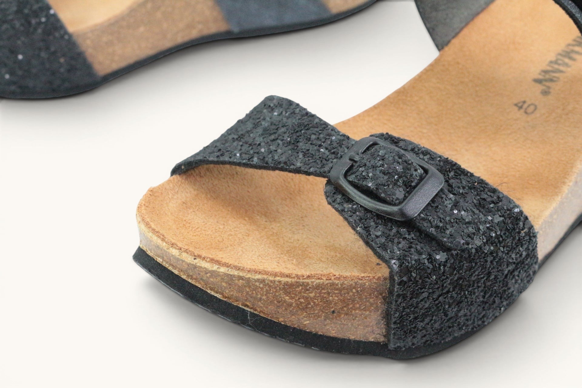 Mules Frippindealz Dr Brinkmann noires pailletées avec semelle anatomique en liège et boucle ajustable