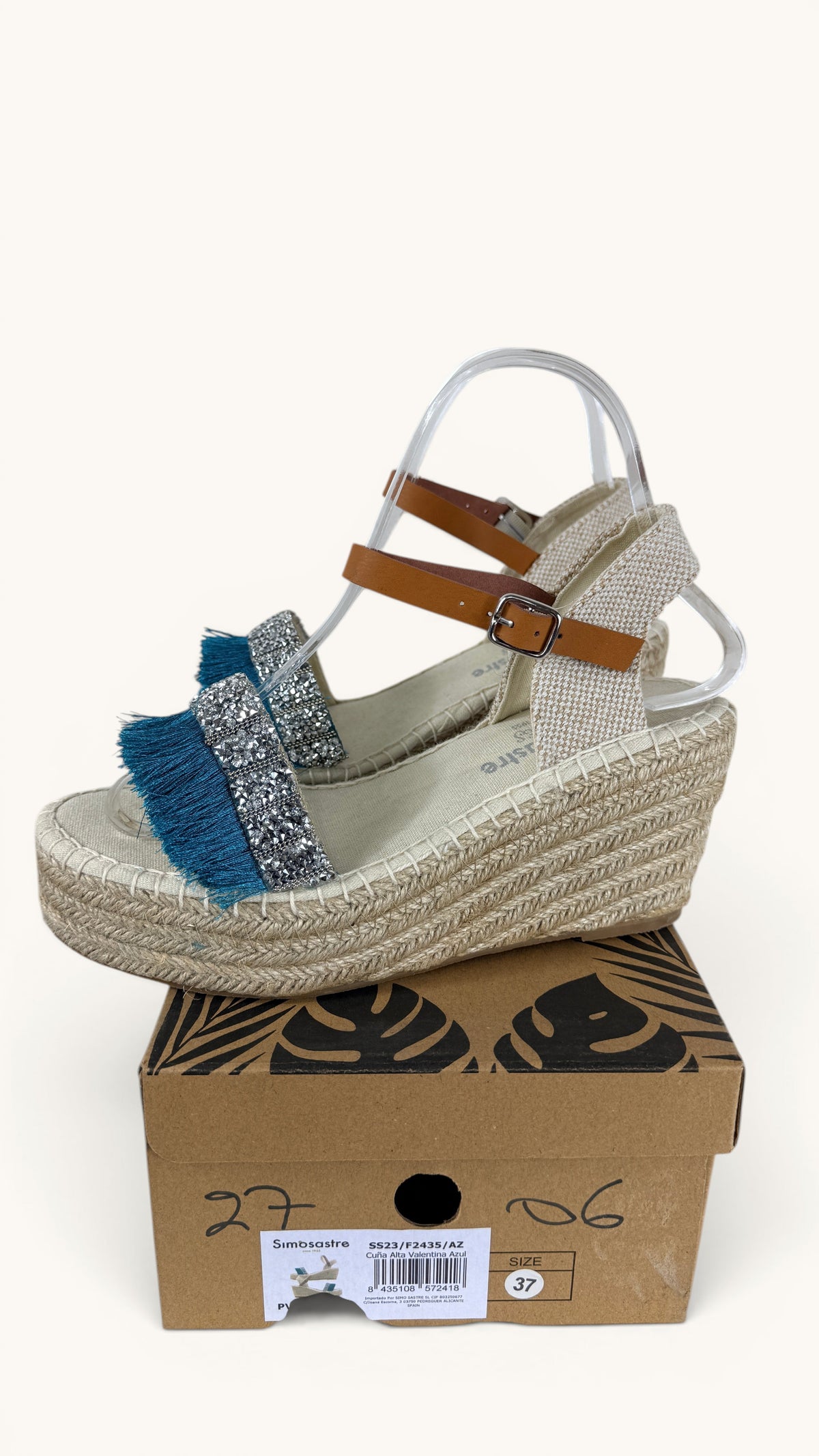 Espadrilles compensées Frippindealz Simó Sastre Valentina en toile écrue, strass argentés et franges bleu turquoise.