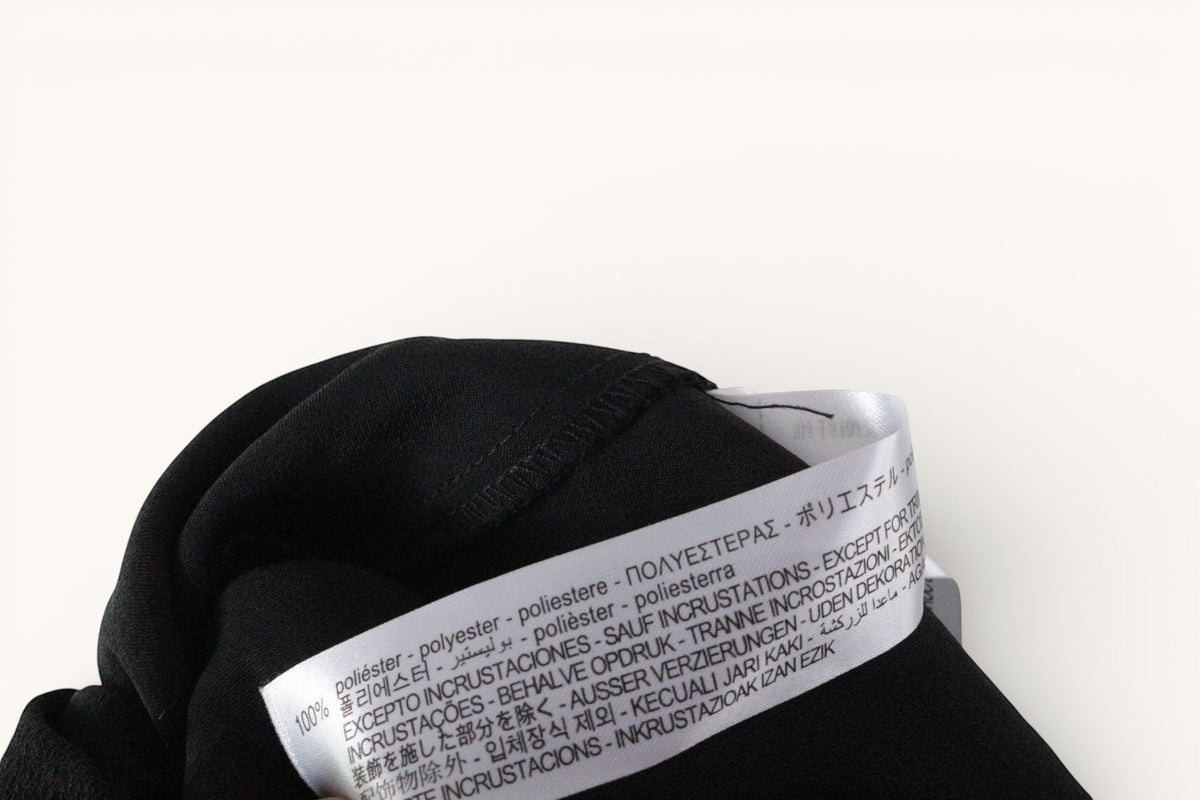 Étiquette de composition en polyester noir de la robe Frippindealz