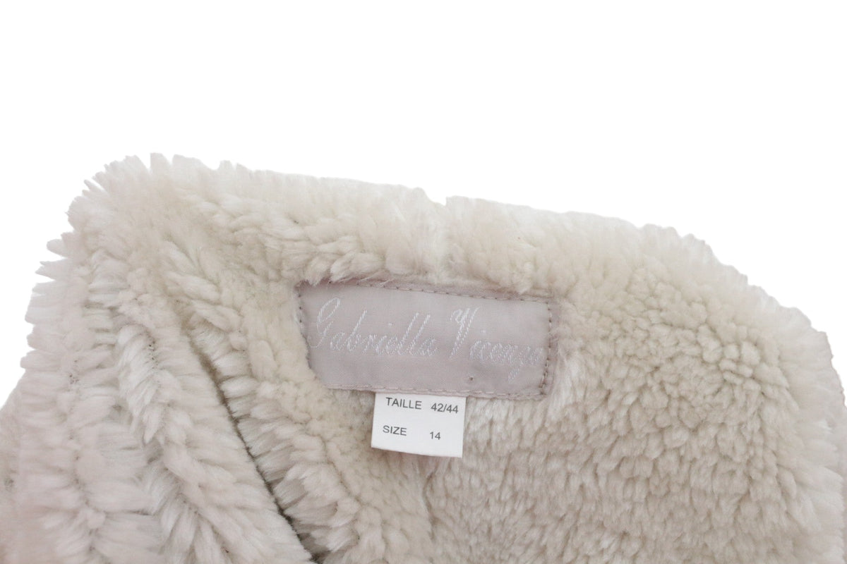 Étiquette intérieure du manteau Frippindealz Gabriella Vincenza en polyester beige avec texture effet peau vintage