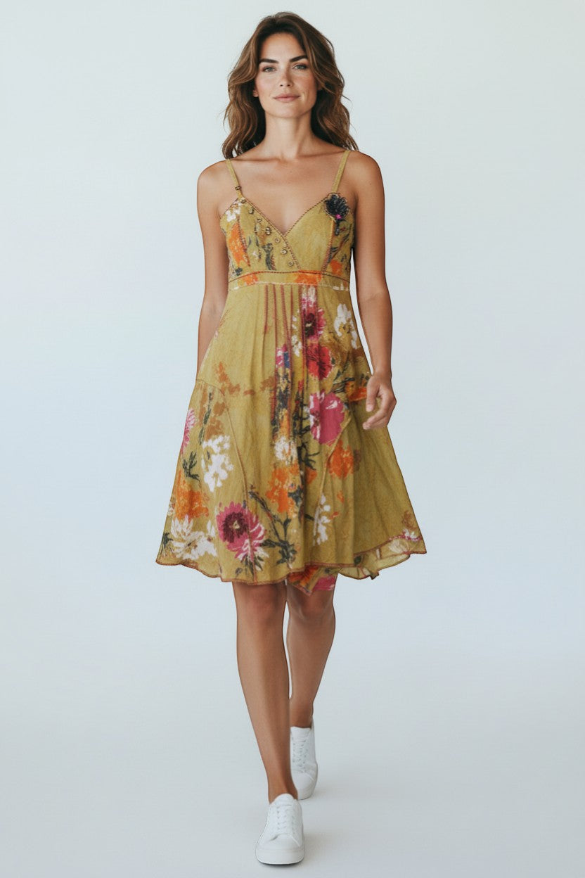 Frippindealz green cotton midi dress with a vibrant floral print, spaghetti straps, and a flattering A-line cut.