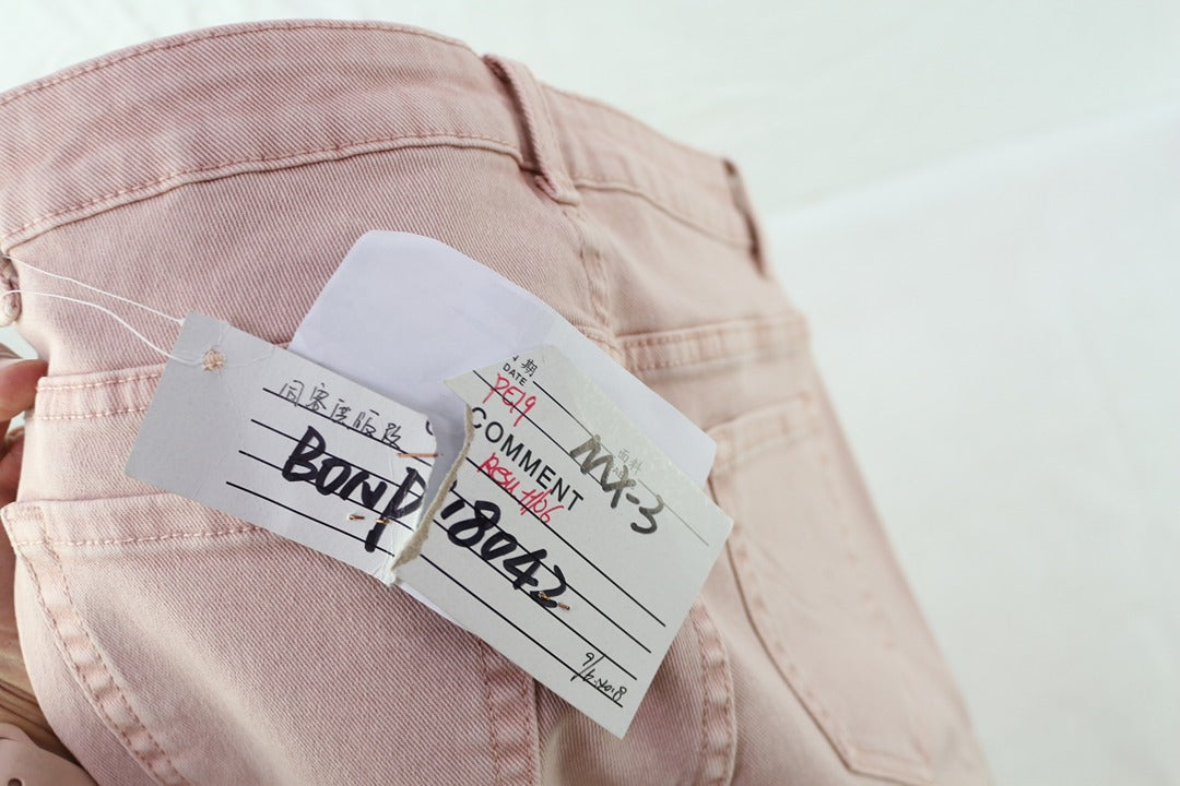 Jean skinny rose Frippindealz en coton avec étiquette de contrôle qualité attachée