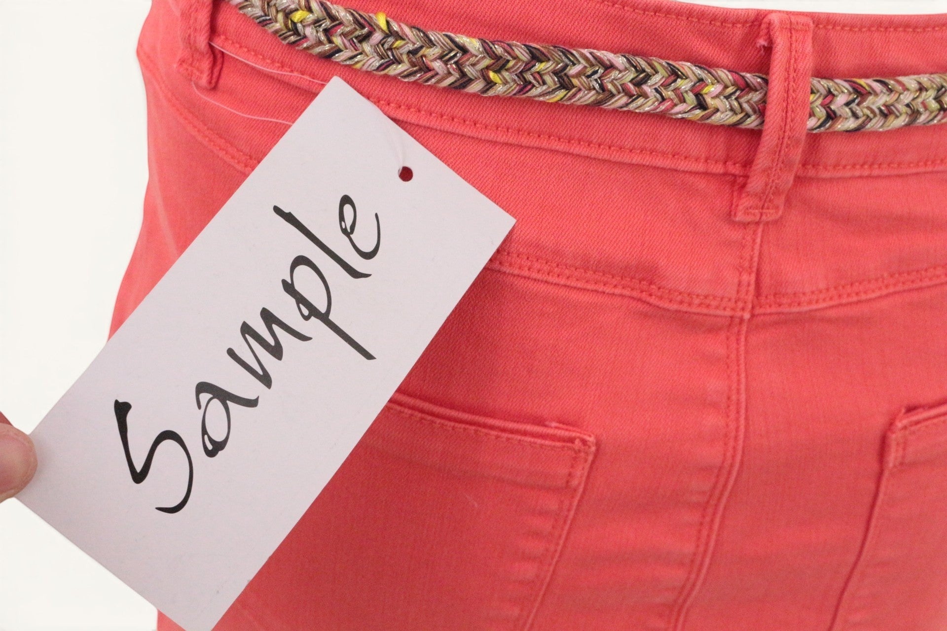 Frippindealz Jupe corail en coton stretch, taille 38, avec ceinture tressée multicolore. Coupe droite, idéale pour l'été.