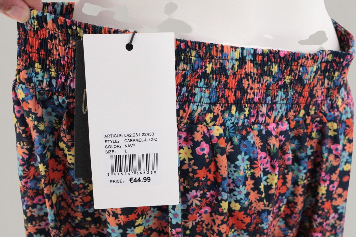 Jupe longue fleurie Frippindealz bleu marine avec taille élastiquée et étiquette de prix neuve