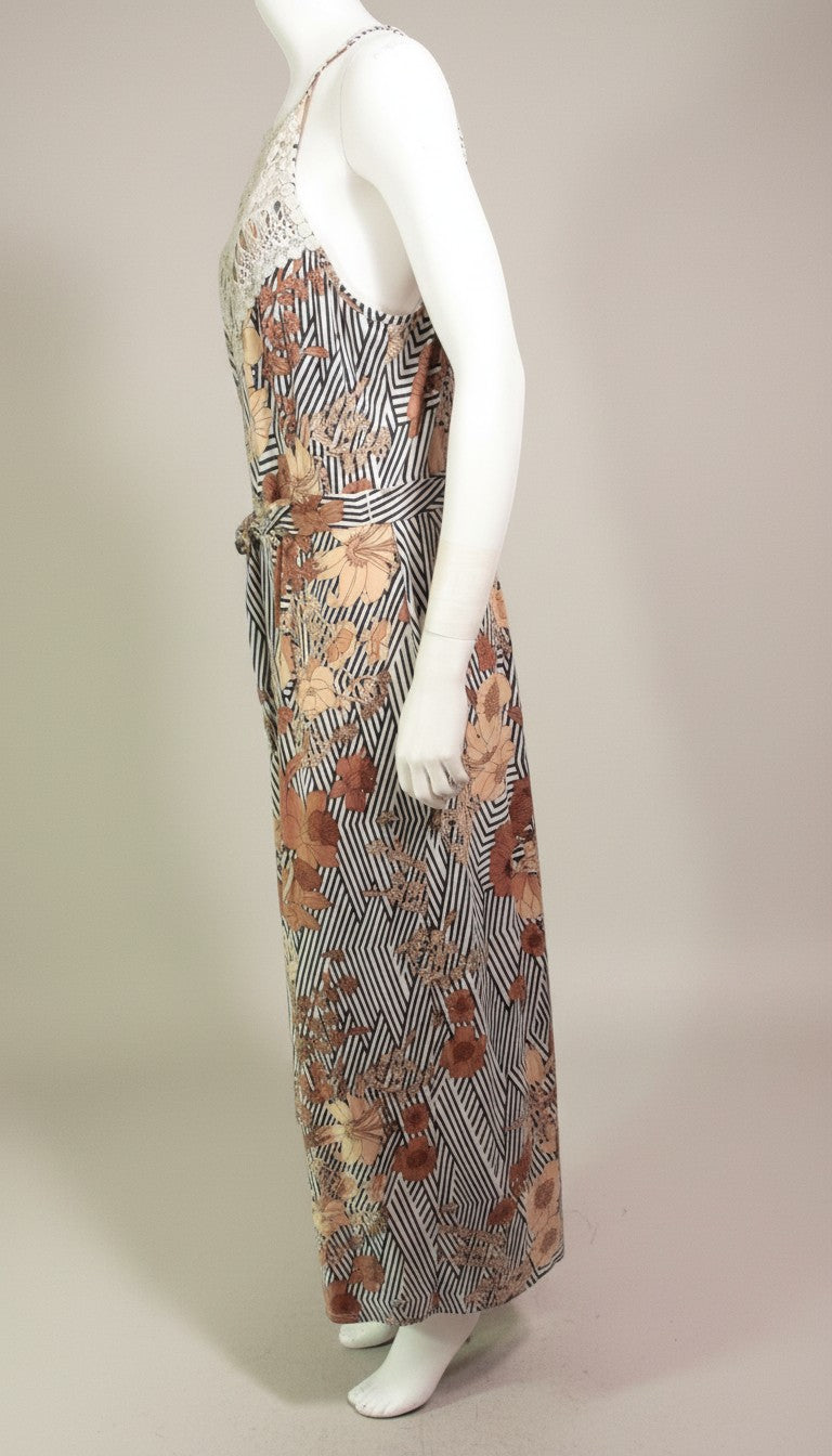 Frippindealz K design polyester maxi dress with floral print, crochet neckline, and belted waist in white, beige, and brown.