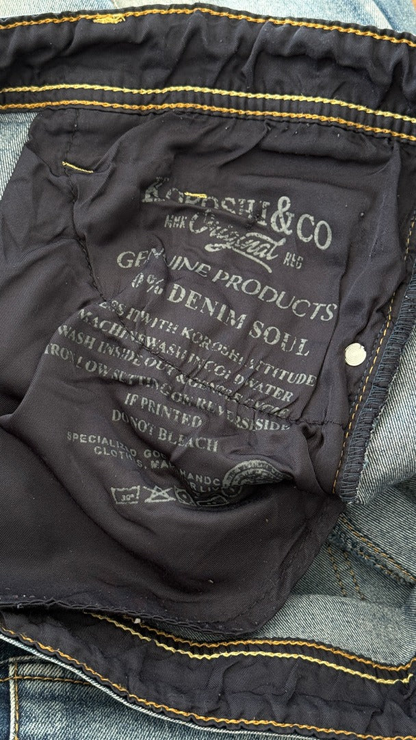 Étiquette intérieure de jeans Frippindealz Koröshi en coton bleu avec instructions de lavage