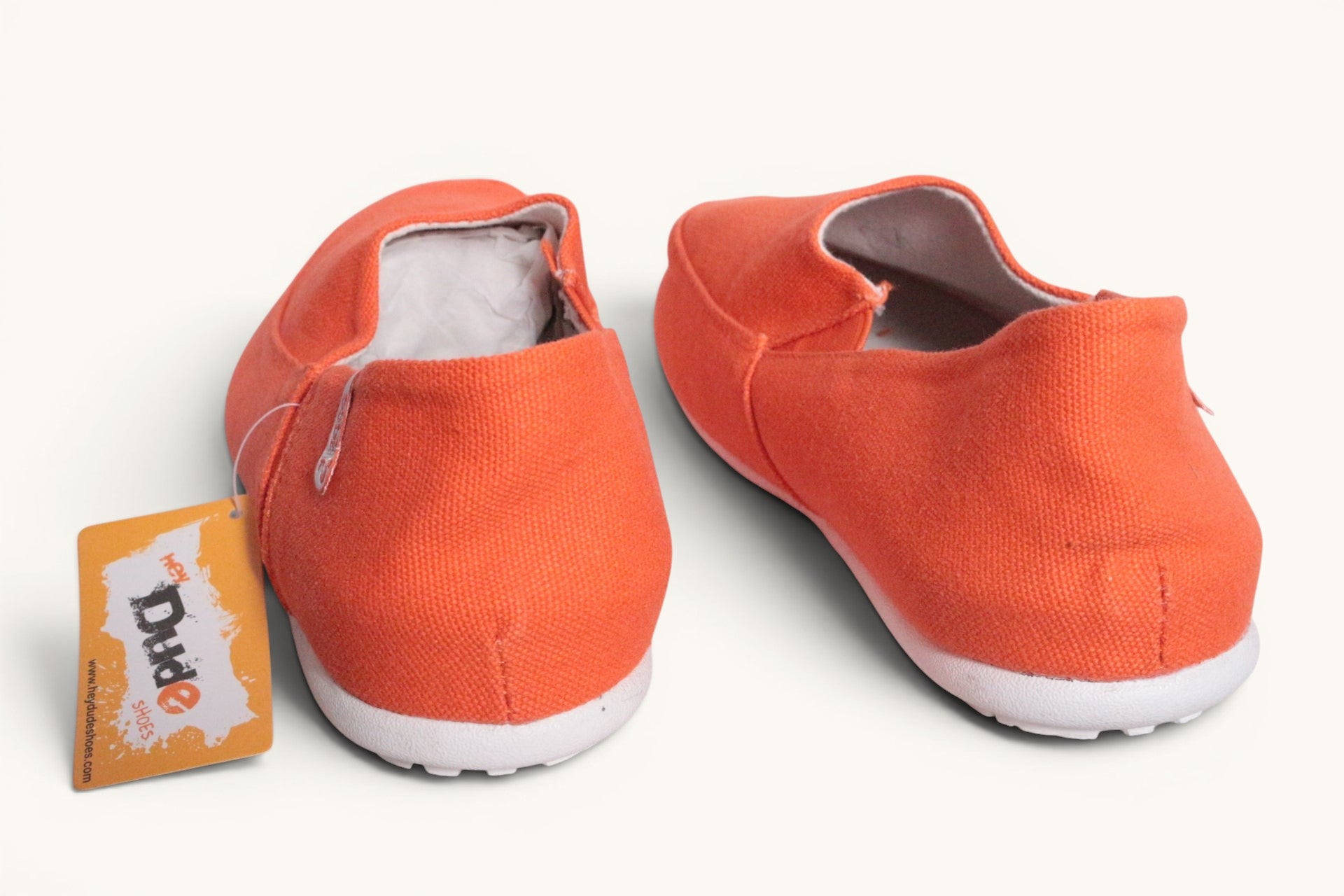Chaussures mocassins textile orange pour femme et homme de la marque Frippindealz, légères et confortables.