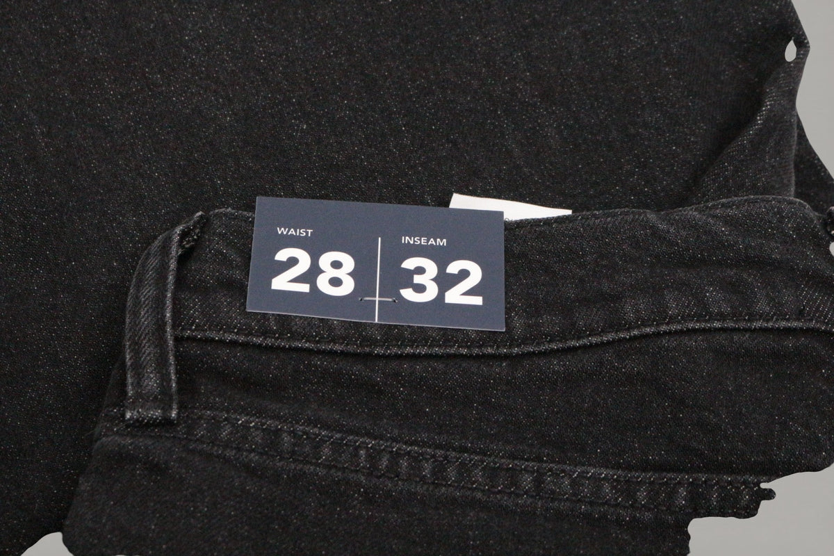 Jean noir Tommy Hilfiger neuf en coton recyclé avec étiquette de taille 28x32 chez Frippindealz