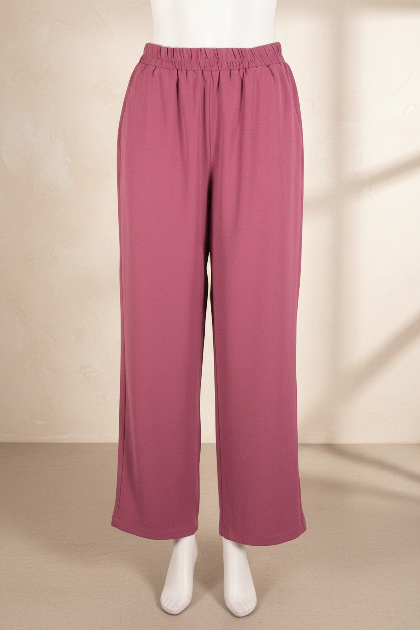 Pantalon large Grace & Mila couleur vieux rose en polyester avec taille élastique, présenté par Frippindealz