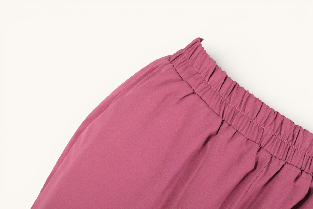 Pantalon Grace & Mila en polyester vieux rose avec taille élastique confortable, vendu par Frippindealz.