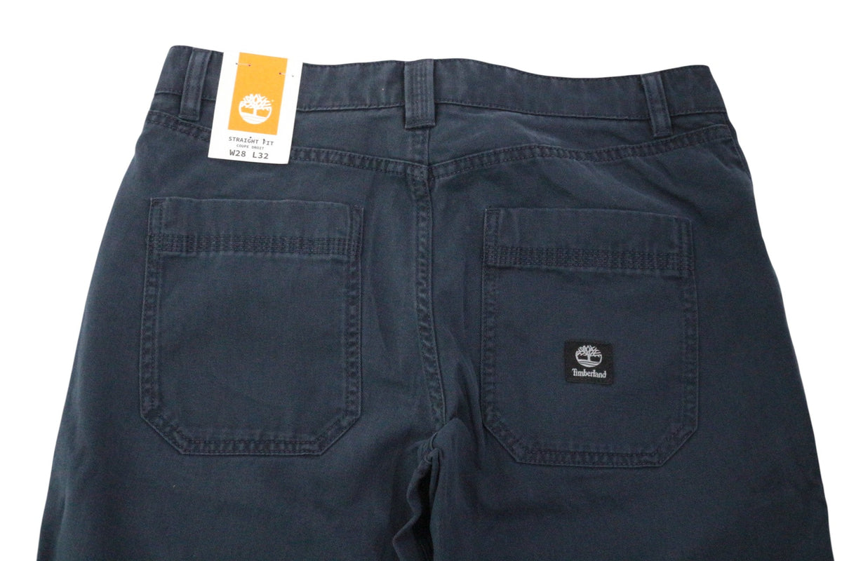Pantalon Timberland bleu marine en coton avec coupe droite et étiquette Frippindealz, vue arrière des poches