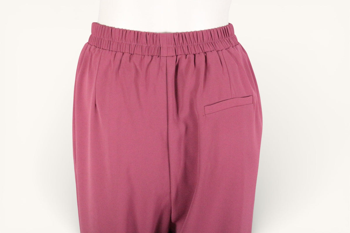 Pantalon Grace & Mila en polyester vieux rose avec taille élastique et poche arrière, vendu par Frippindealz