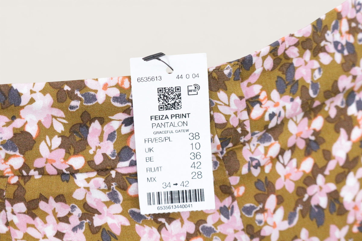 Pantalon Frippindealz en viscose kaki à motif floral rose, coupe ample style bohème chic avec étiquette de prix