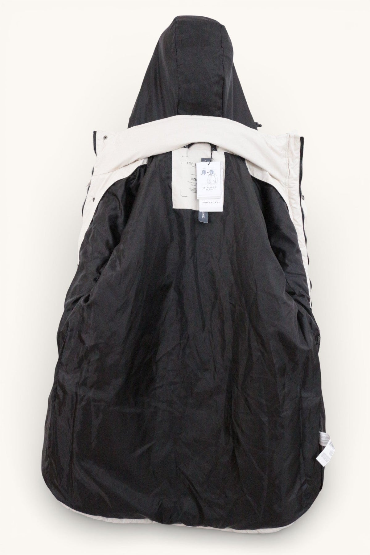 Parka Frippindealz Top Secret blanche en polyester avec capuche détachable, vue intérieure, état neuf avec étiquette