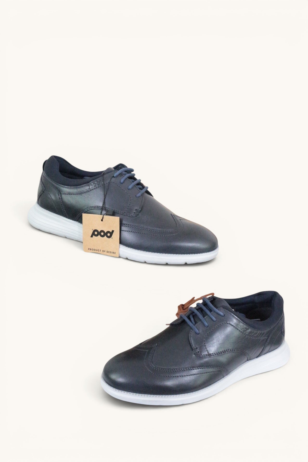 Chaussures homme Frippindealz POD Vantage en cuir bleu marine avec semelle blanche légère et lacets assortis