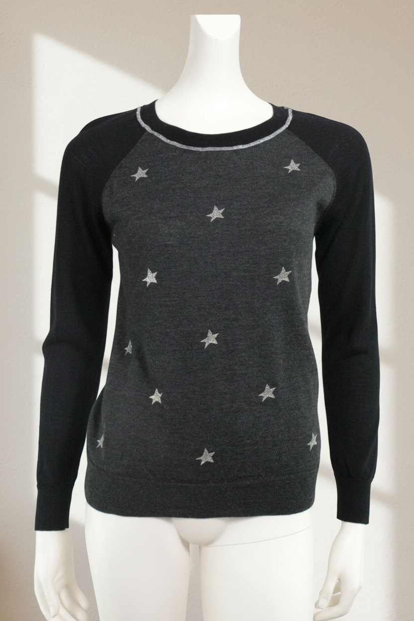 Pull Caroll Frippindealz noir en laine mérinos avec motifs étoiles argentées et détails en lurex brillant
