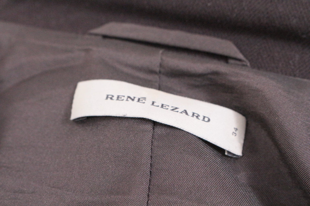 Étiquette de marque René Lezard à l'intérieur d'un blazer marron élégant de chez Frippindealz