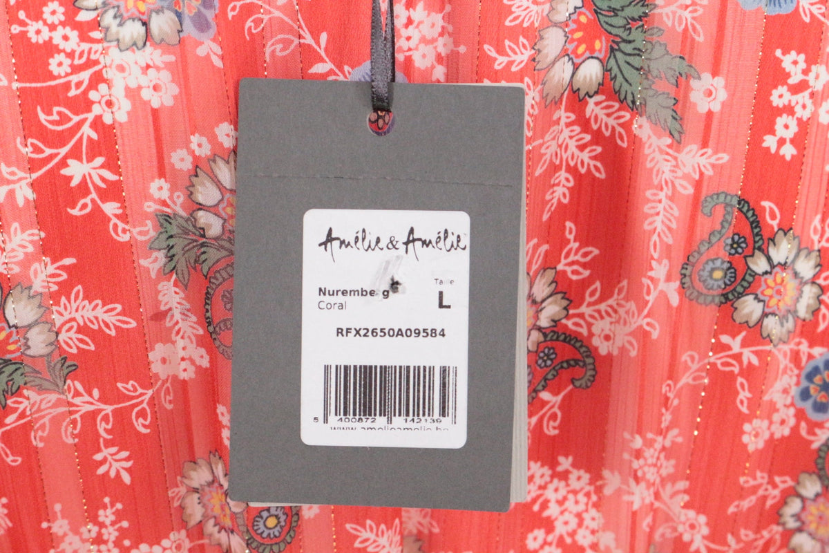 Etiquette de prix sur robe mi-longue corail à motif floral de la marque Frippindealz
