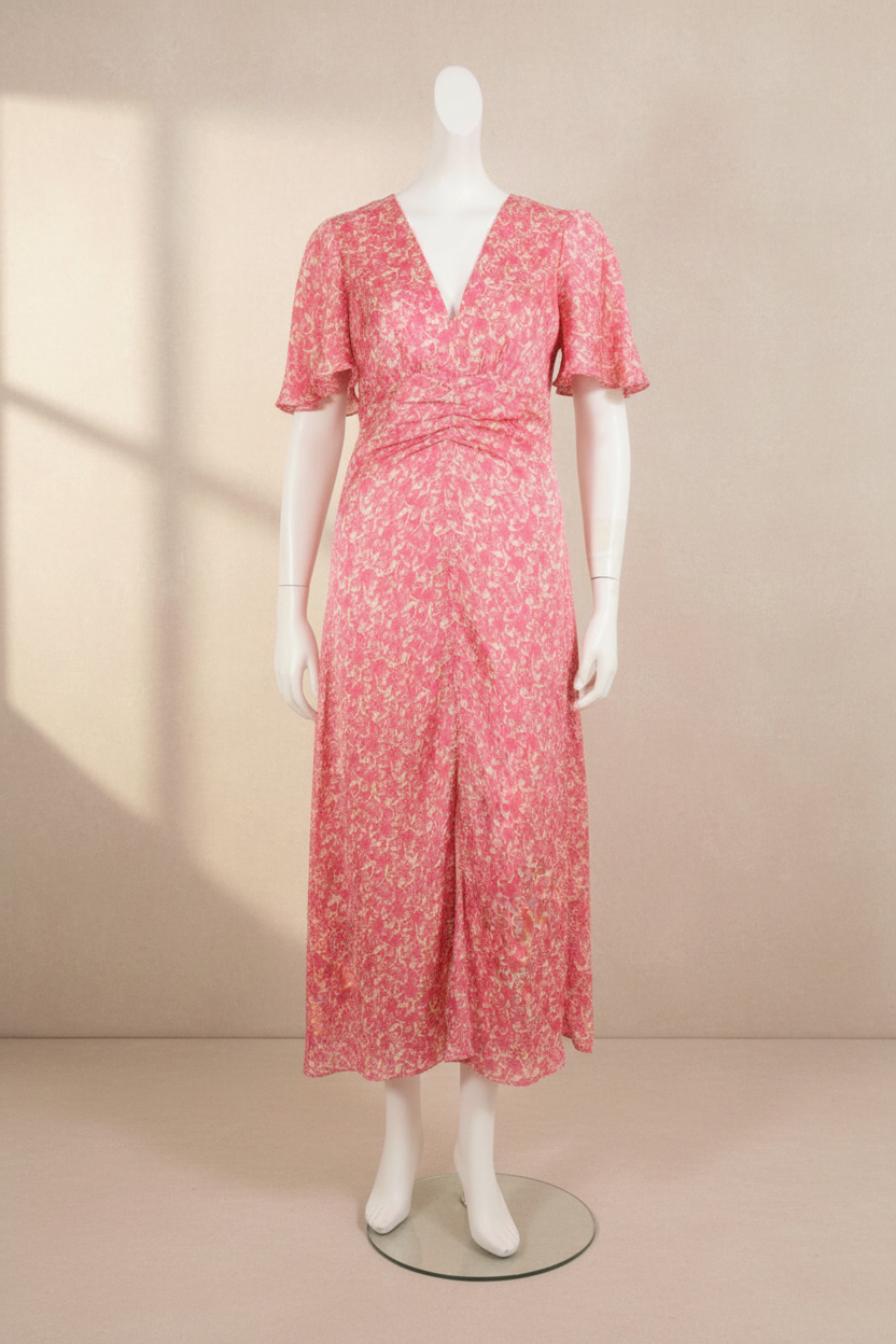 Robe longue Frippindealz Charlior en polyester rose et blanc avec motif floral, col en V et manches évasées.