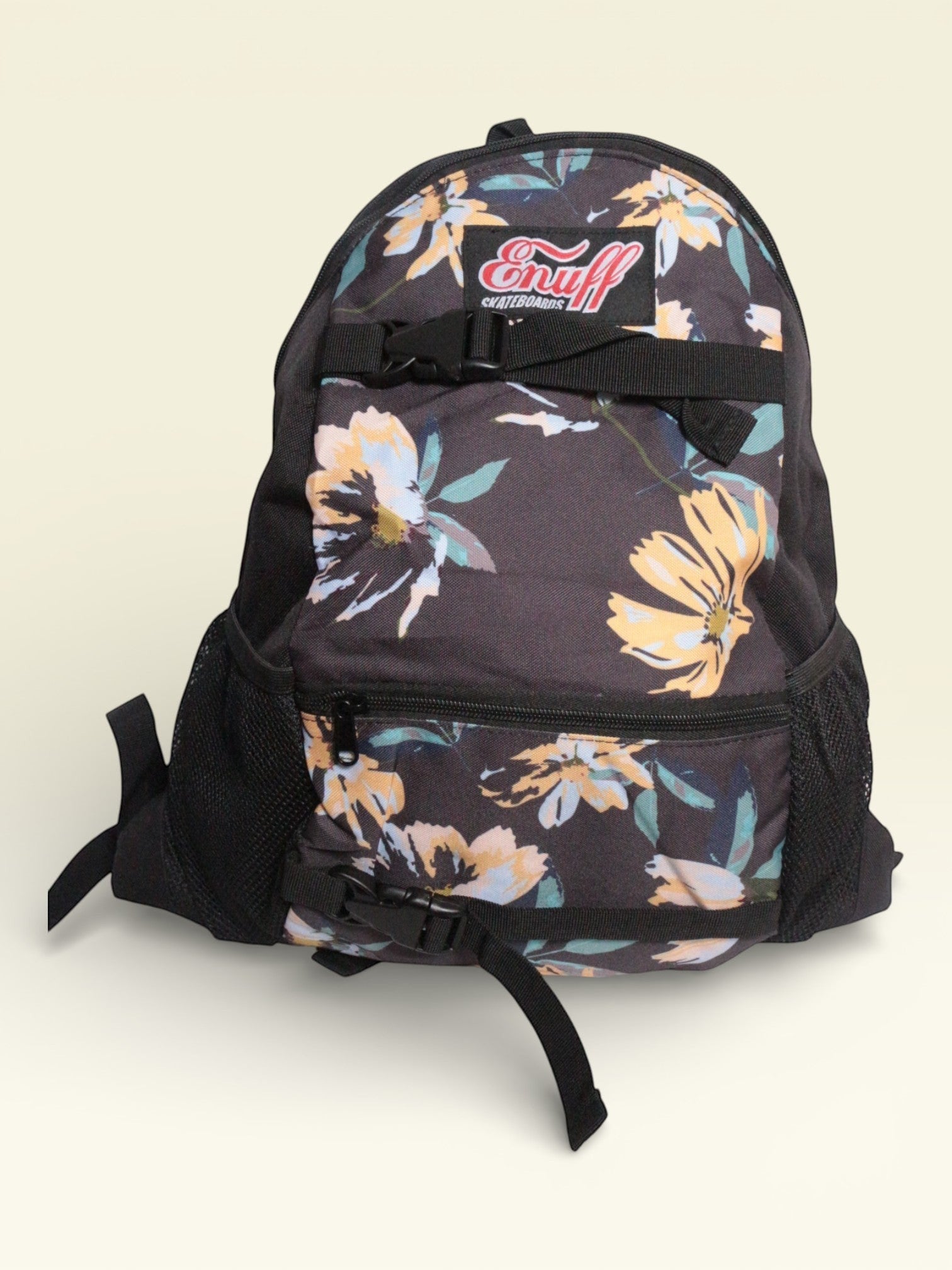 Sac à dos Enuff Skateboards noir avec motif floral jaune et bleu, polyester, neuf